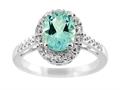9x7mm Oval Blue Topaz and White Topaz Ring
