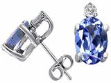 Tommaso Design™ Oval 7x5mm Genuine Tanzanite And Diamond Earring Studs
