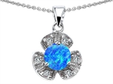 Original Star K™ Flower Pendant With Round 6mm Created Blue Opal