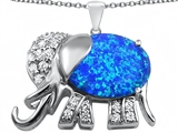 Original Star K™ Large 12x10mm Oval Created Blue Opal Good Luck Elephant Pendant