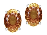 Original Star K™ Oval 8x6mm Simulated Imperial Yellow Topaz Earring Studs
