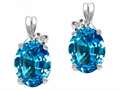 Tommaso Design™ Oval 8x6mm Genuine Blue Topaz and Diamond Earrings