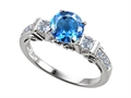 Engagement Ring With 6 Genuine Diamonds And Genuine Round Blue Topaz