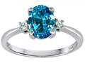 Genuine 8x6mm Oval Blue Topaz and Diamond Engagement Ring