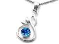 Original Star K™ Round Simulated Blue Topaz Swan Pendant