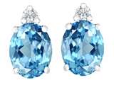 Star K™ 8x6mm Oval Simulated Blue Topaz Earrings Studs style: 307194