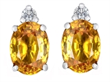 Star K™ 8x6mm Oval Simulated Citrine Earrings Studs style: 307195